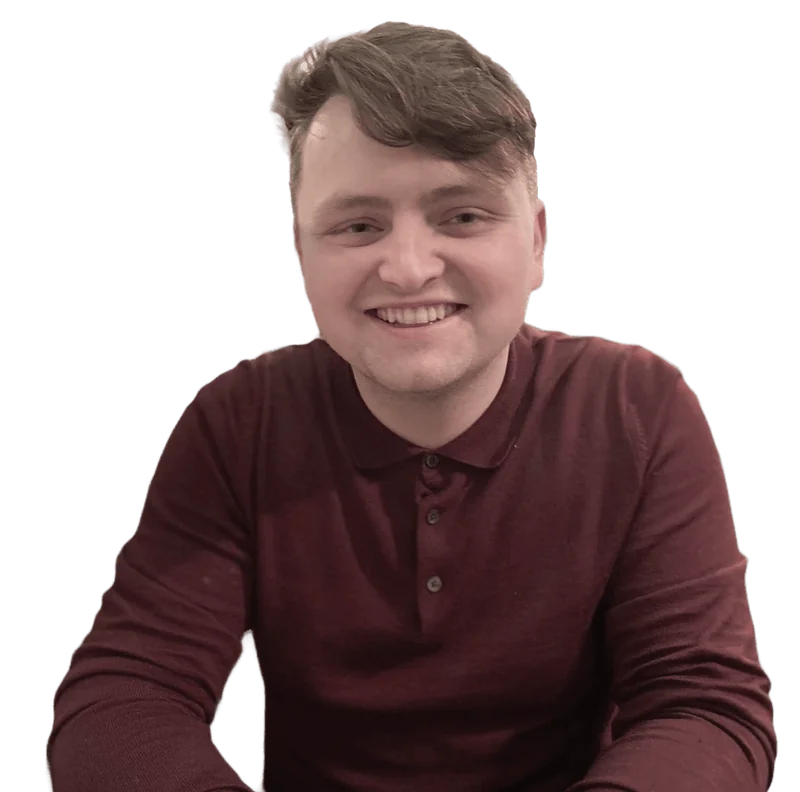 Daniel Morris, smiling, in a burgundy polo shirt